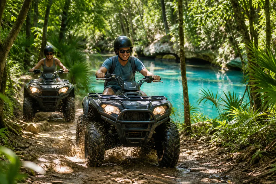 Travelers riding ATVs through the tropical Riviera Maya jungle
